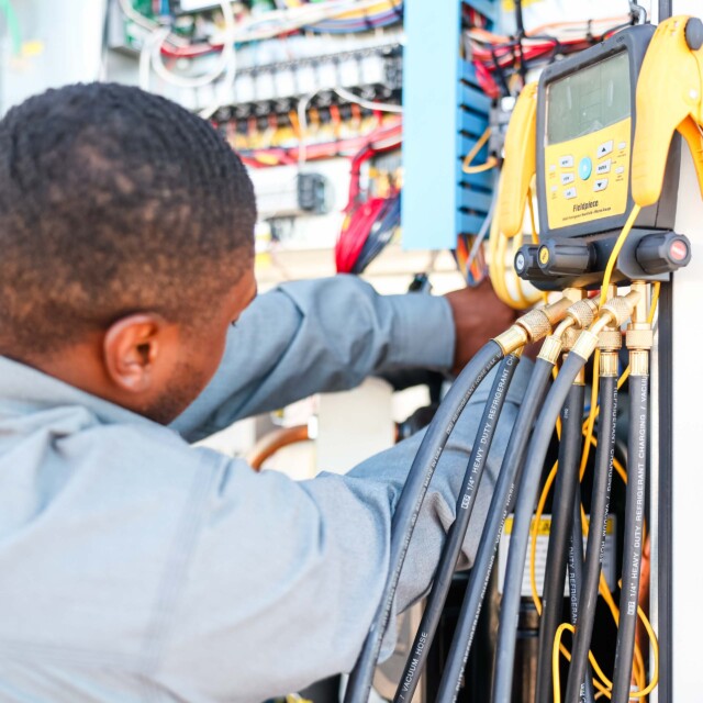 Man working on wiring.