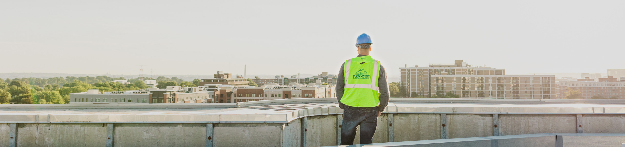 Man standing on ledge.