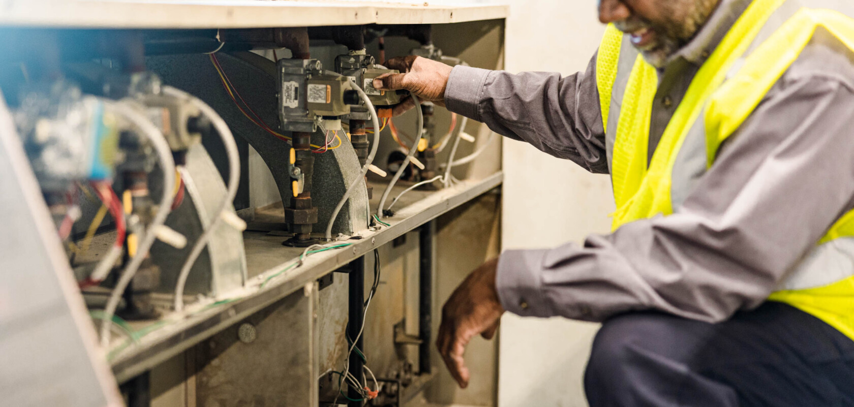 Man working on wiring.